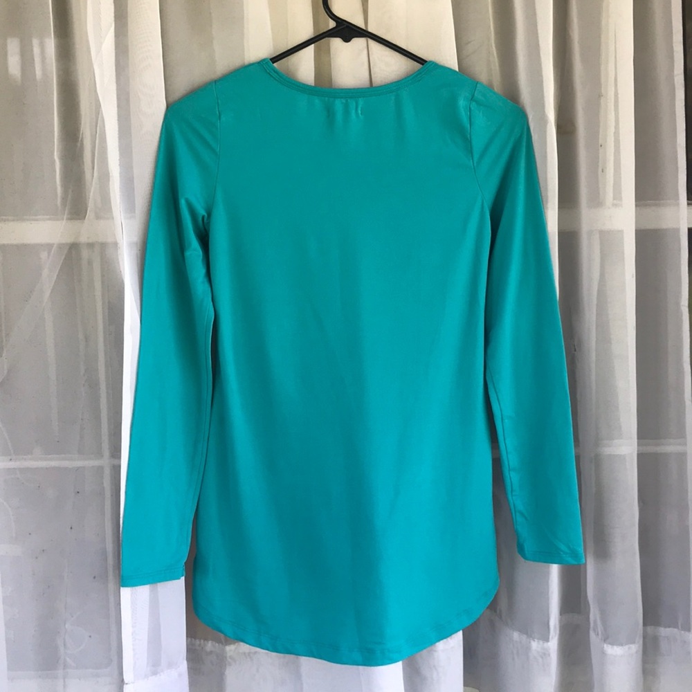 Long sleeve green tunic with lace detail